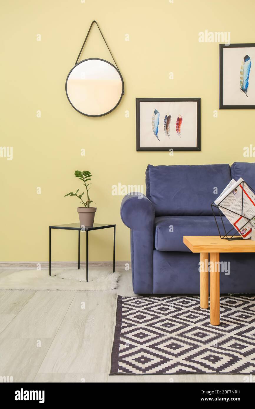 Interior of modern living room with comfortable sofa and table Stock ...