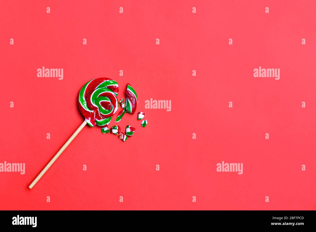 Crushed lollipop on color background Stock Photo - Alamy