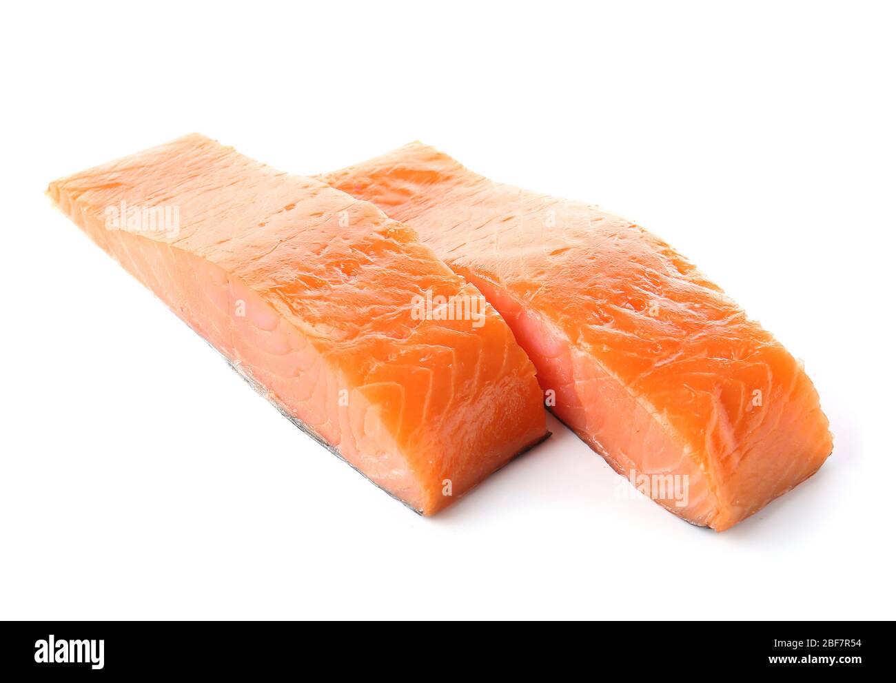 Raw salmon fillet on white background Stock Photo - Alamy