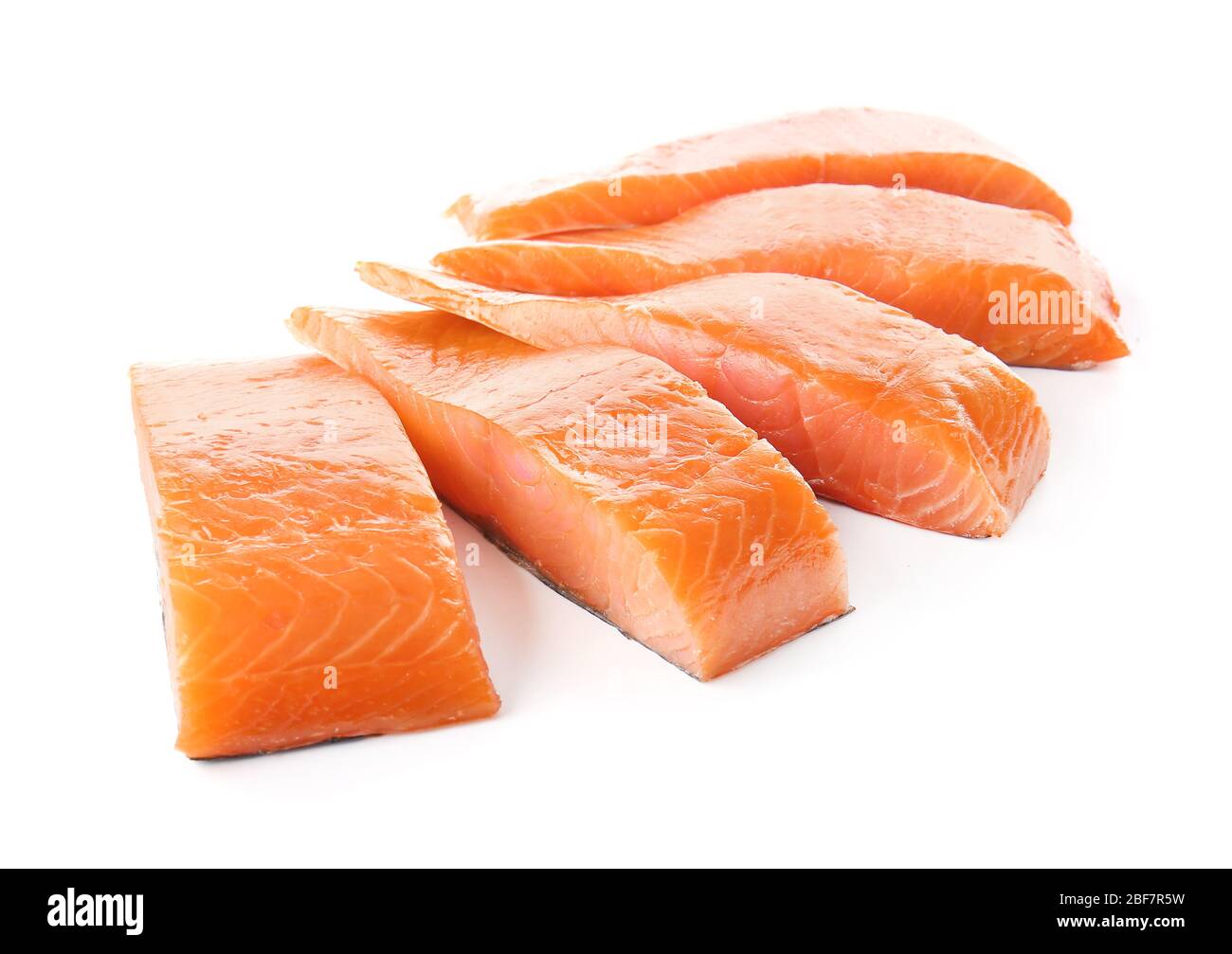 Raw salmon fillet on white background Stock Photo - Alamy