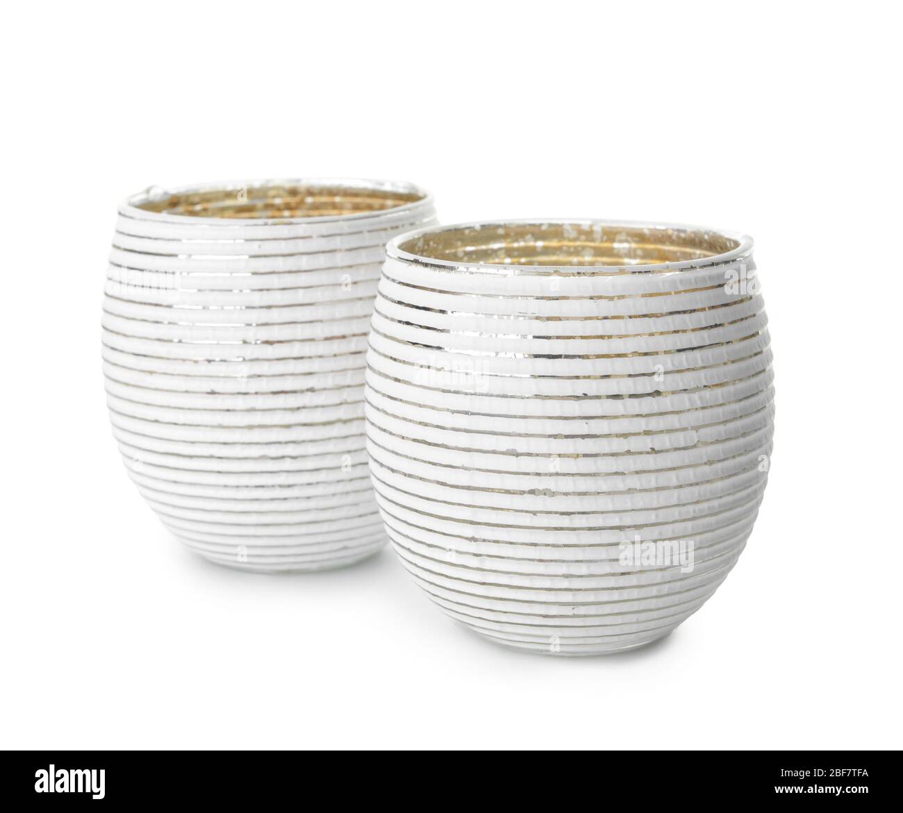 Stylish candle holders on white background Stock Photo - Alamy