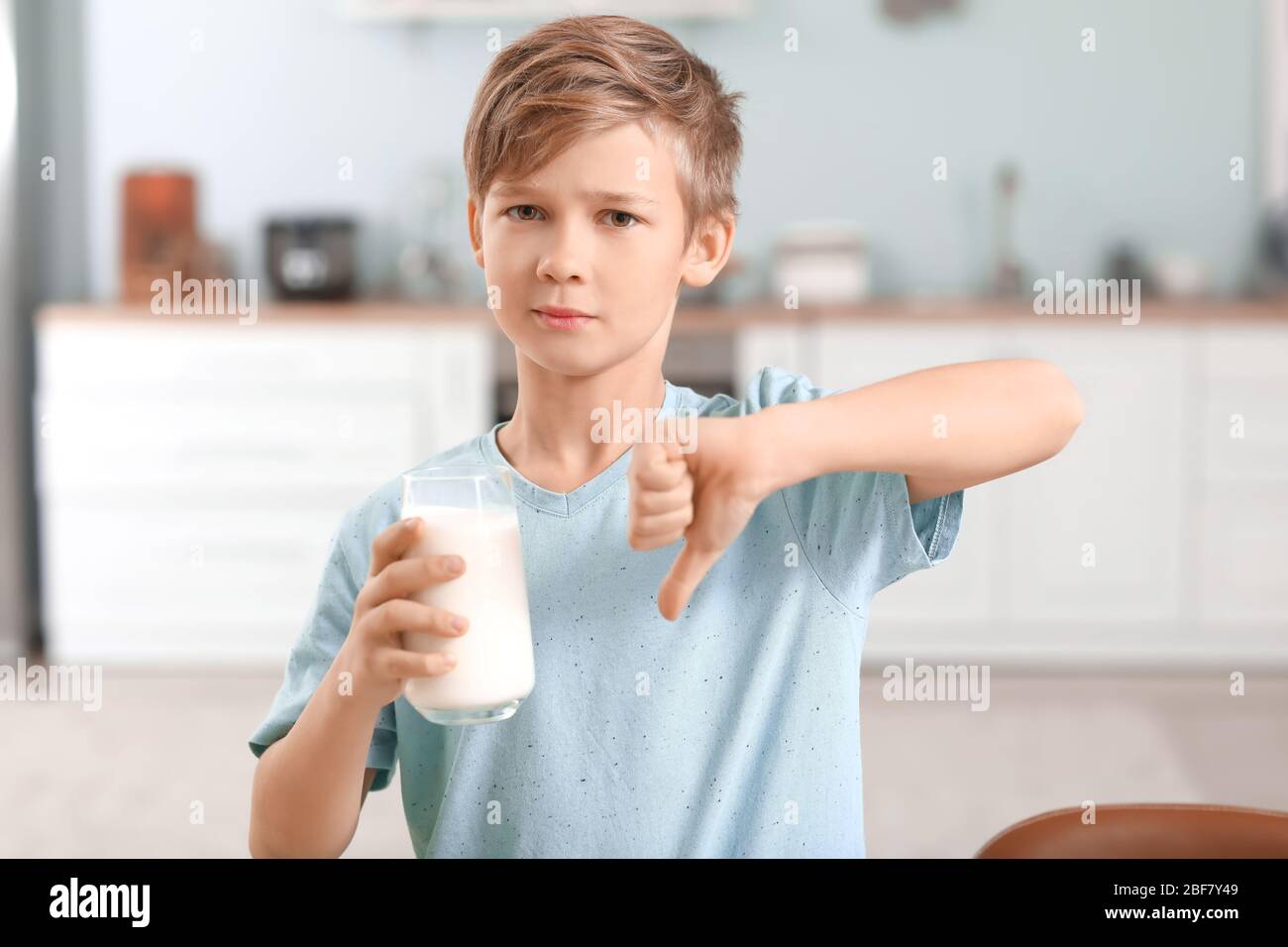 Little boy with dairy allergy in kitchen Stock Photo Alamy