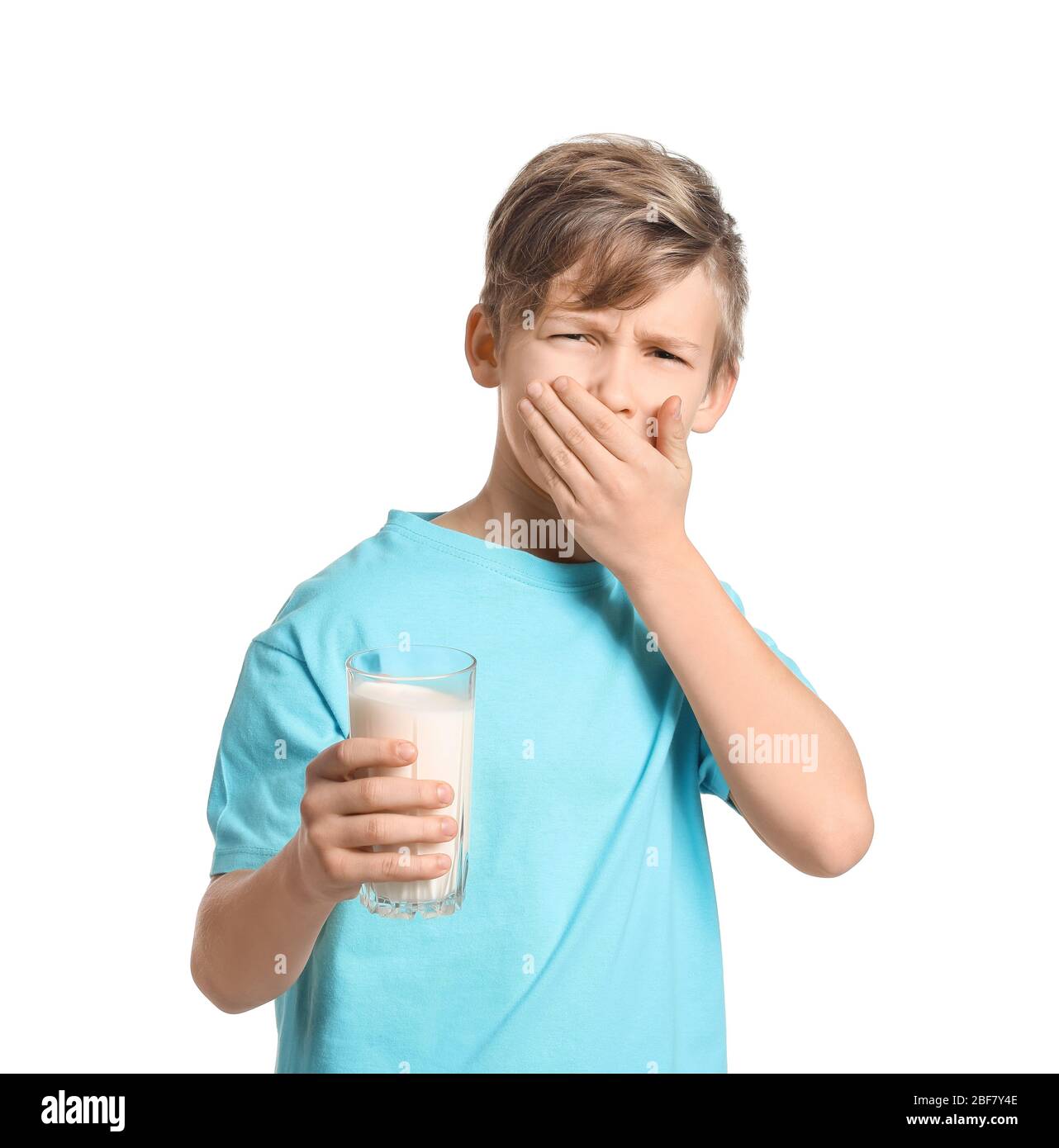 Little boy with dairy allergy on white background Stock Photo Alamy