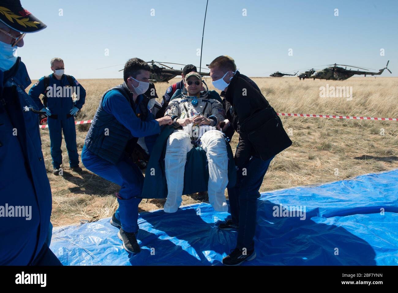 Zhezkazgan, Kazakhstan. 17th Apr, 2020. Expedition 62 crew member Andrew Morgan of NASA is carried to an All Terrain Vehicle (ATV) shortly after he, NASA astronaut Jessica Meir, and Roscosmos cosmonaut Oleg Skripochka landed in their Soyuz MS-15 spacecraft near the town of Zhezkazgan, Kazakhstan on on April 17, 2020. Meir and Skripochka returned after 205 days in space, and Morgan after 272 days in space. All three served as Expedition 60-61-62 crew members onboard the International Space Station. Photo by Andrey Shelepin/NASA/GCTC//UPI Credit: UPI/Alamy Live News Stock Photo