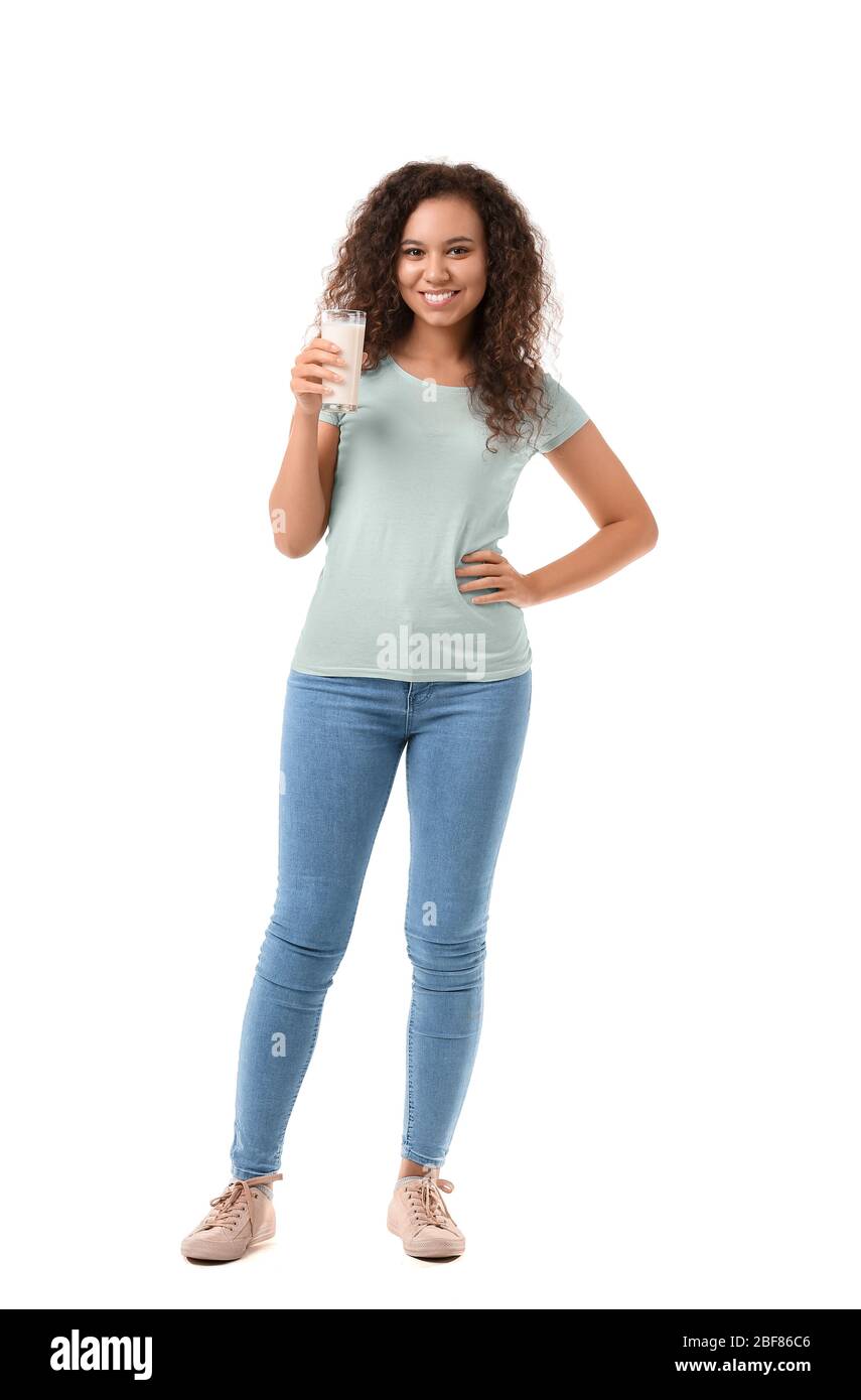 African-American woman with milk on white background Stock Photo - Alamy