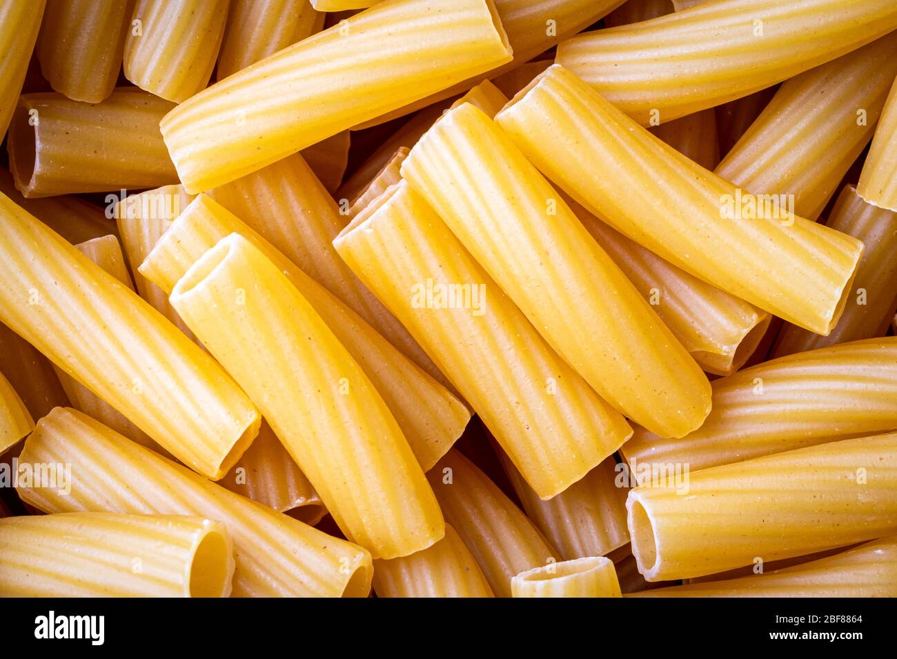 Download Yellow Italian Pasta Tortiglioni Abstract Background Traditional Food Texture Stock Photo Alamy Yellowimages Mockups