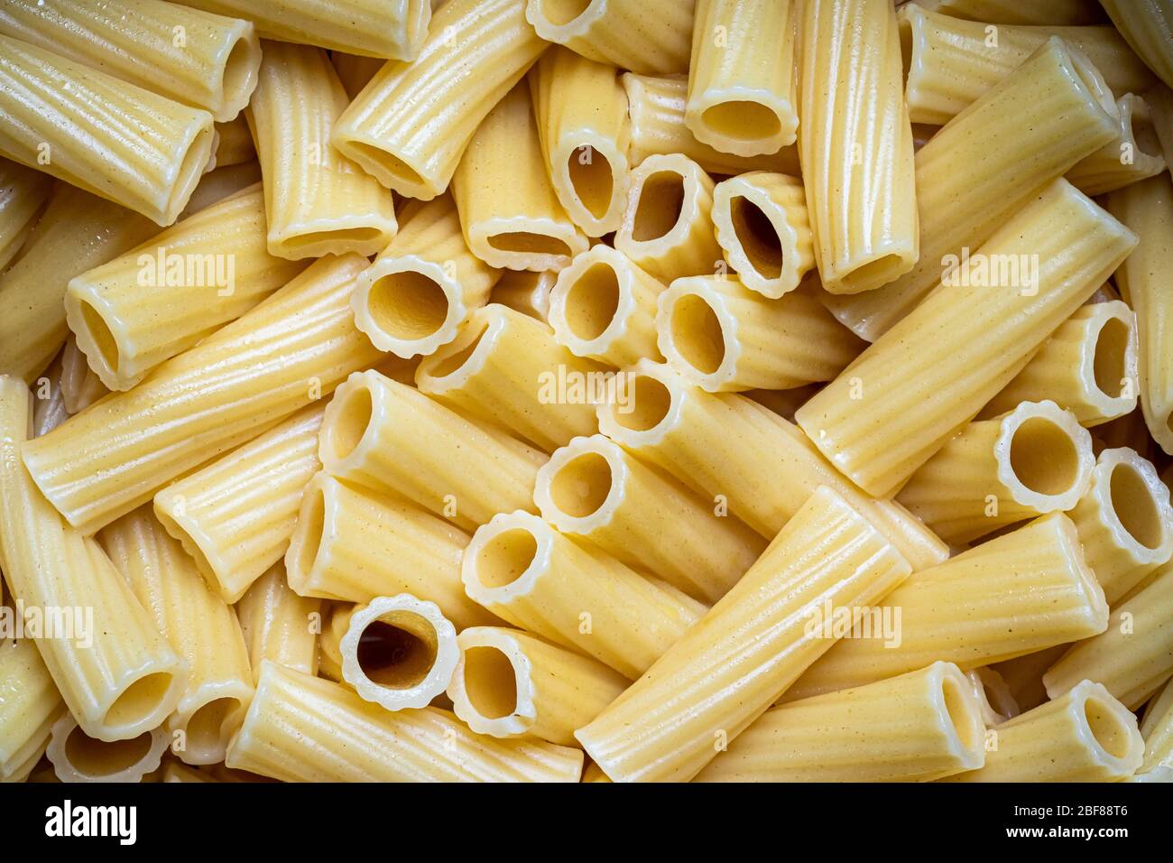 Download Yellow Italian Cooked Pasta Tortiglioni Abstract Background Traditional Food Texture Stock Photo Alamy Yellowimages Mockups