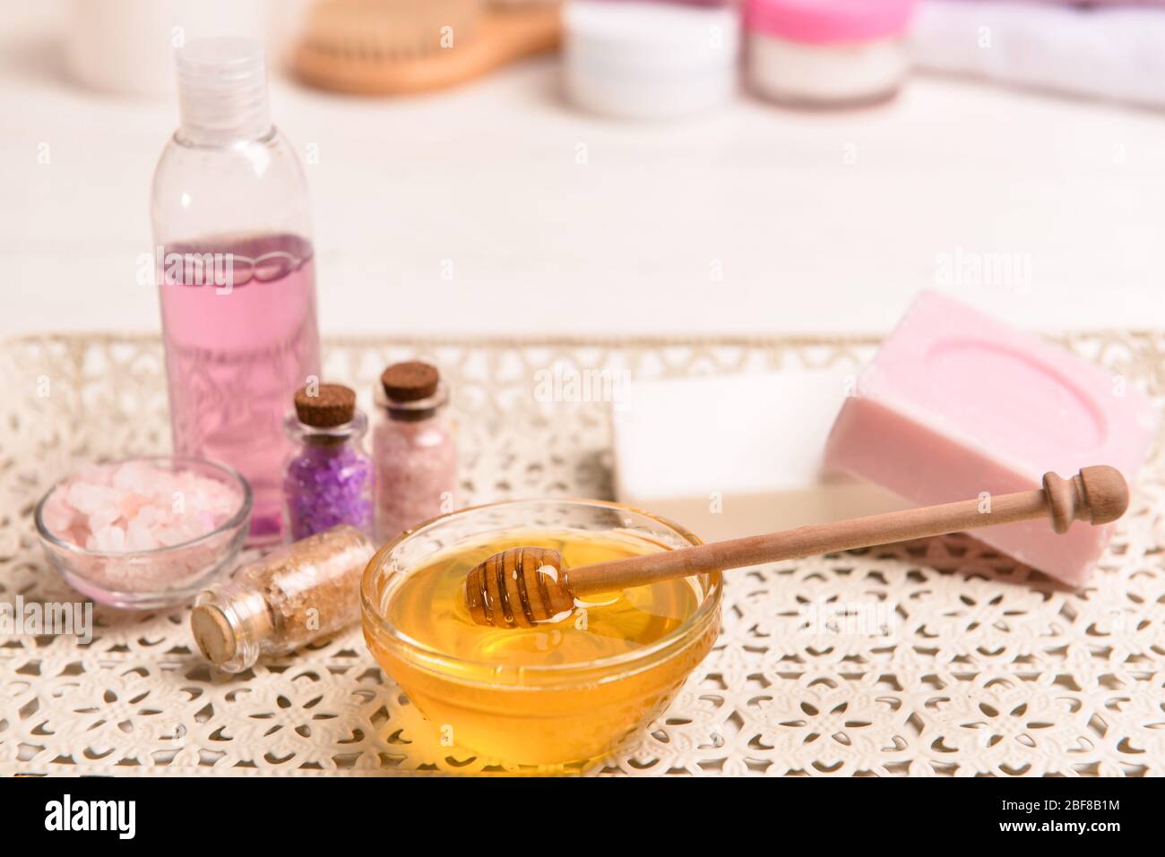 Composition with spa items and honey on table Stock Photo