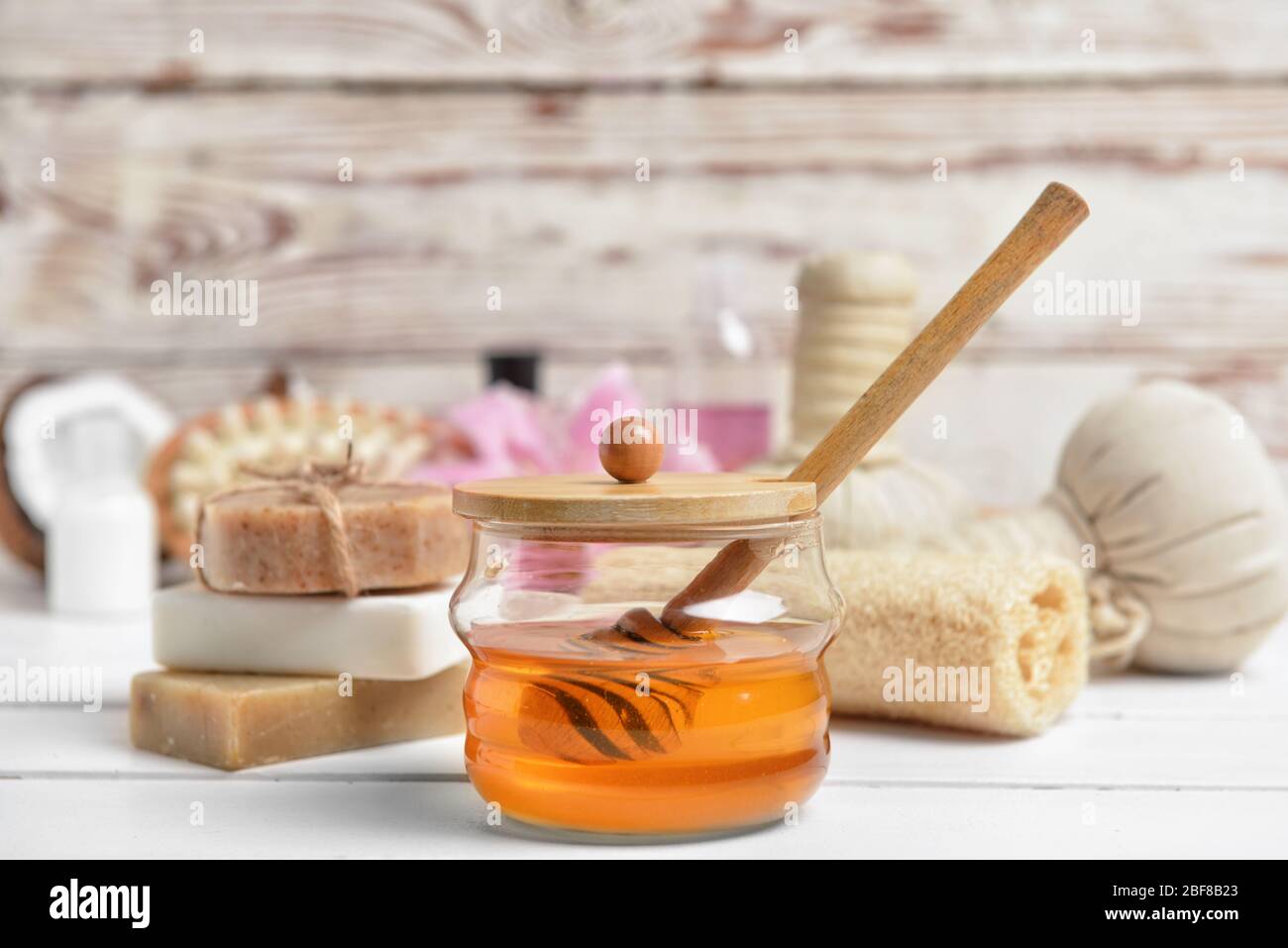 Composition with spa items and honey on table Stock Photo