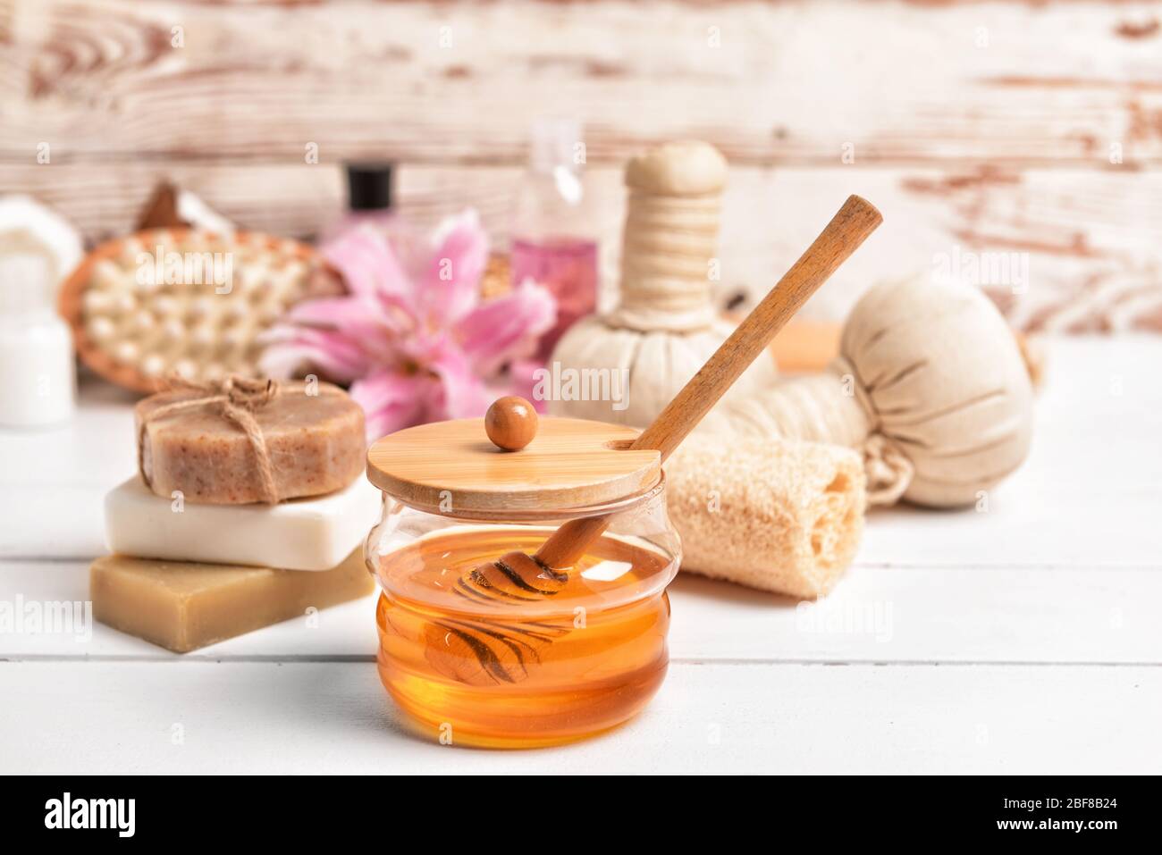 Composition with spa items and honey on table Stock Photo