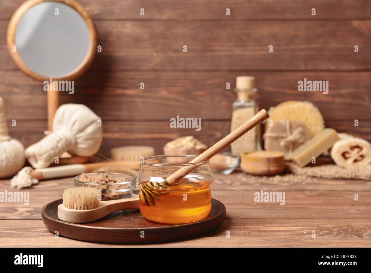 Composition with spa items and honey on table Stock Photo