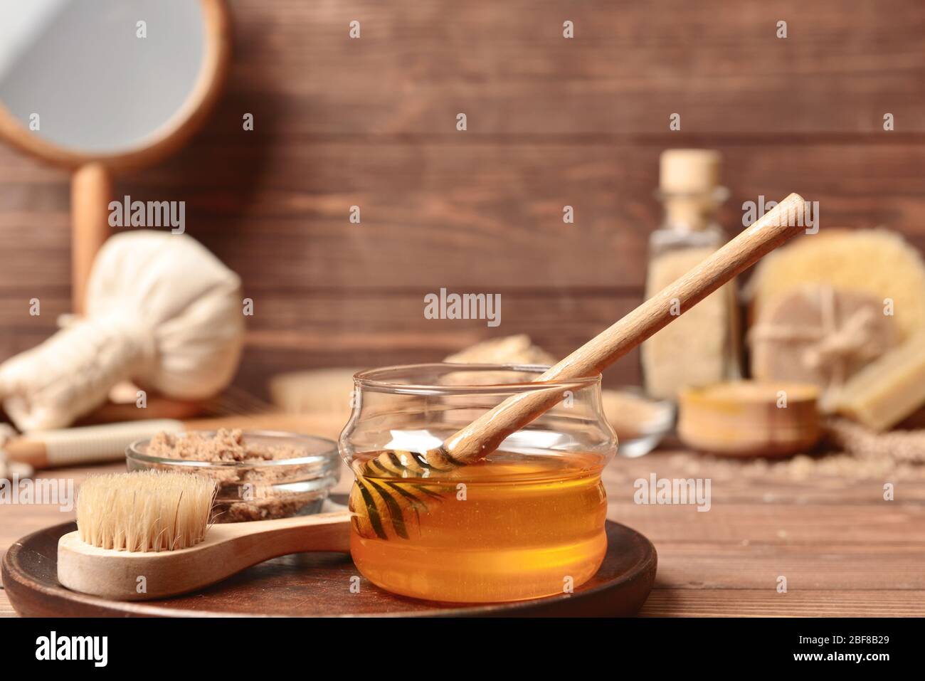 Composition with spa items and honey on table Stock Photo