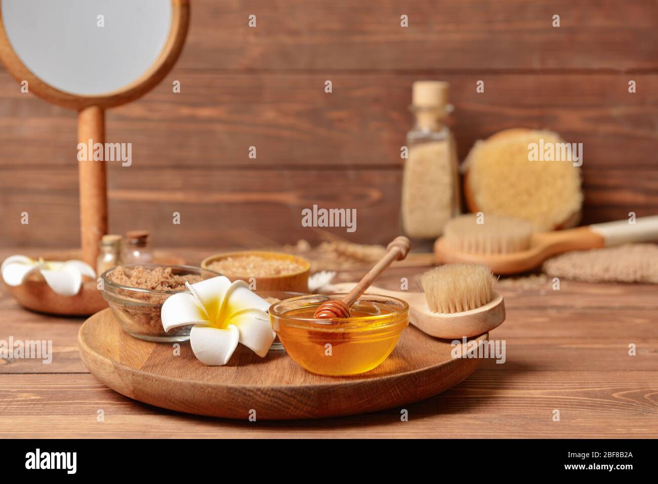 Composition with spa items and honey on table Stock Photo