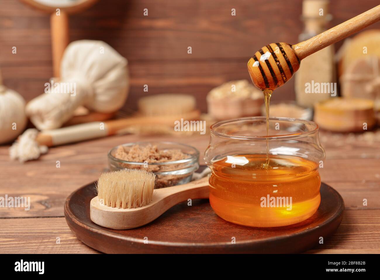 Composition with spa items and honey on table Stock Photo