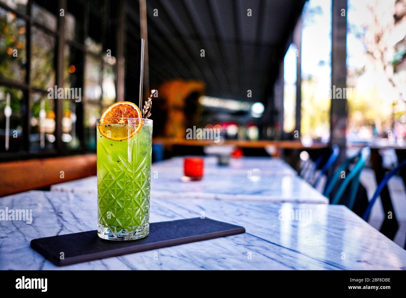 Refreshed Mojito cocktail with Cookie on the marble table. Summer exotic colorful cocktail Stock Photo