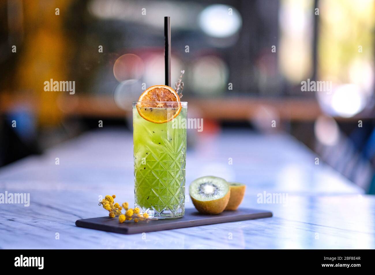 Refreshed Mojito cocktail with Cookie on the marble table. Summer exotic colorful cocktail Stock Photo