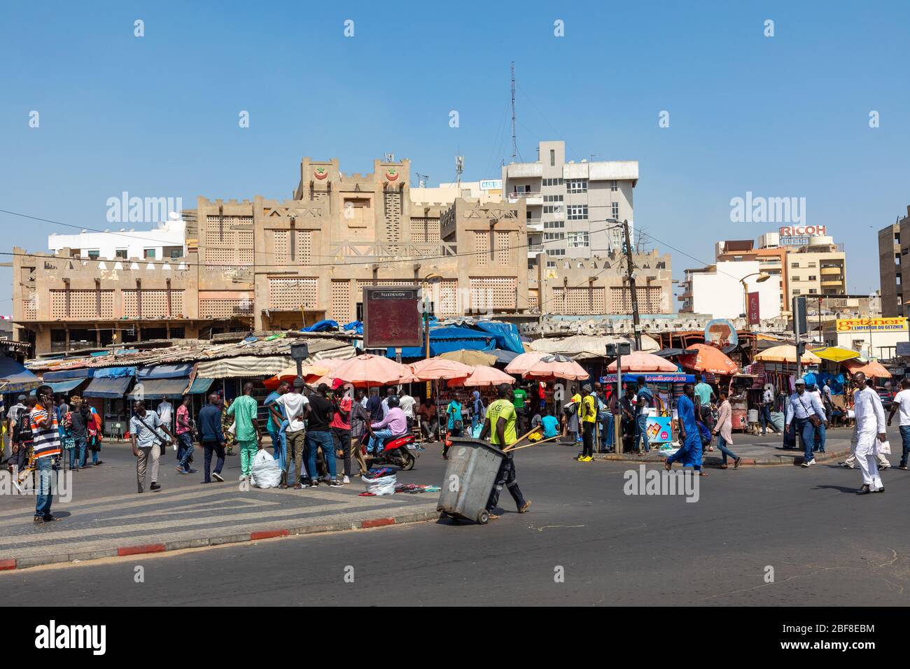 DAKAR, SENEGAL - NOVEMBER 11, 2019: People working and traffic at Senegal capital Dakar, West Africa. Stock Photo