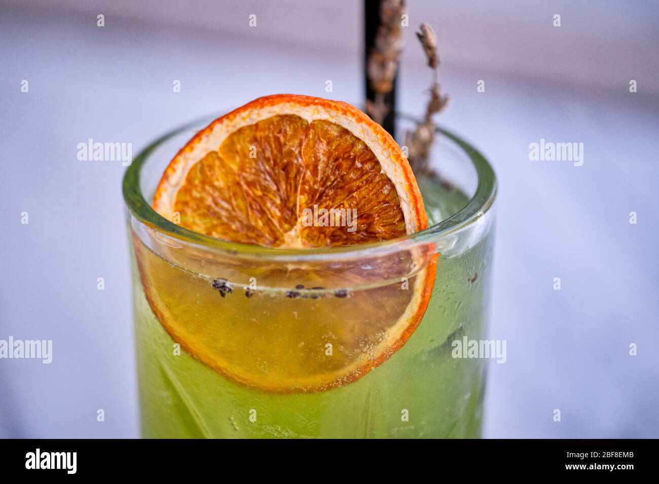 Refreshed Mojito cocktail with Cookie on the marble table. Summer exotic colorful cocktail Stock Photo