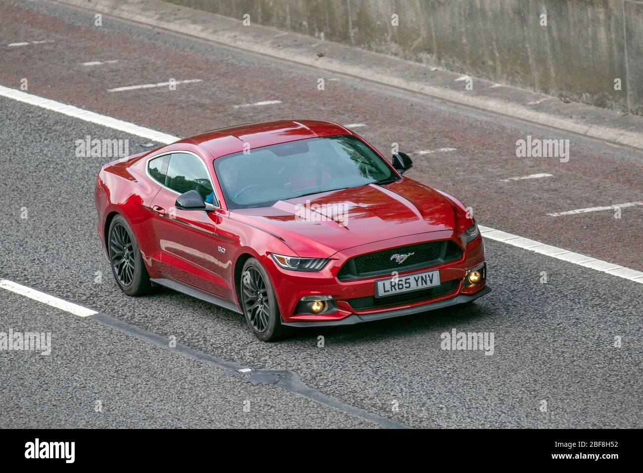 2015-red-ford-mustang-gt-fasbackt-vehicular-traffic-moving-vehicles