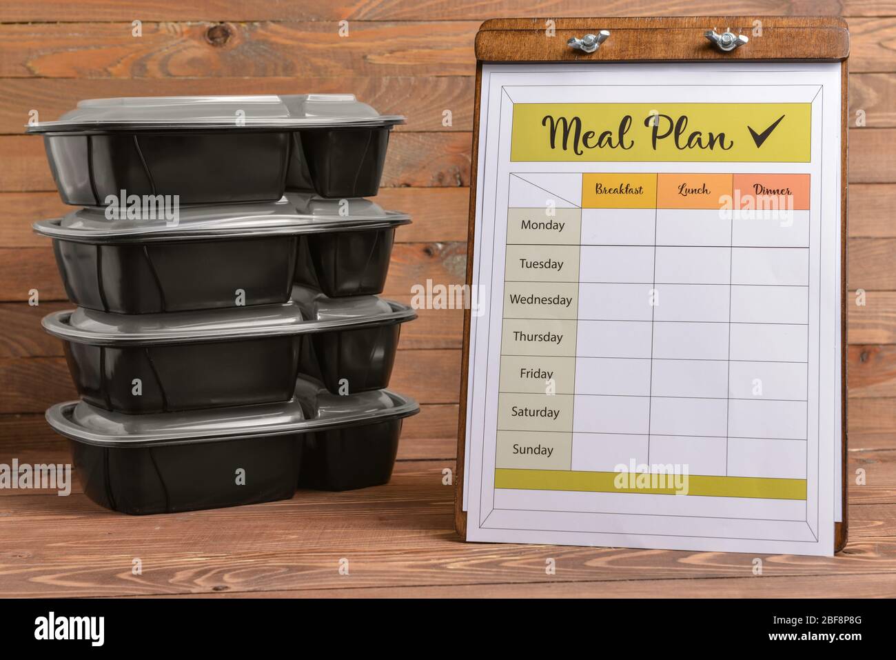 Food Container Plan Containers with healthy food and meal plan on wooden background Stock ...