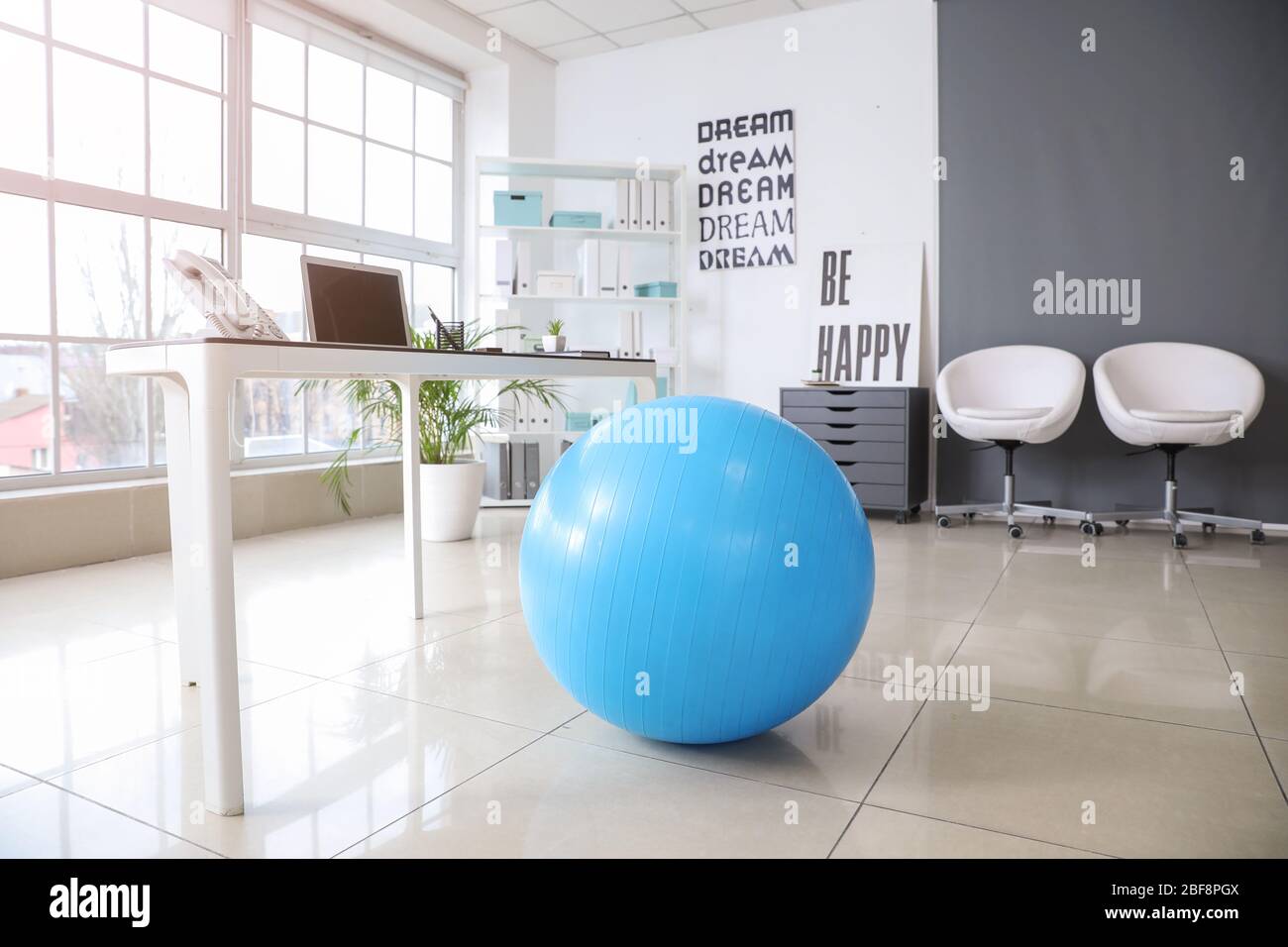 Swiss ball office hires stock photography and images Alamy