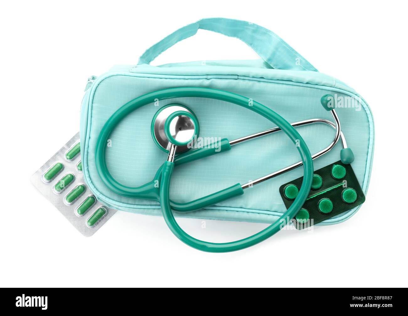 First aid kit with stethoscope on white background Stock Photo