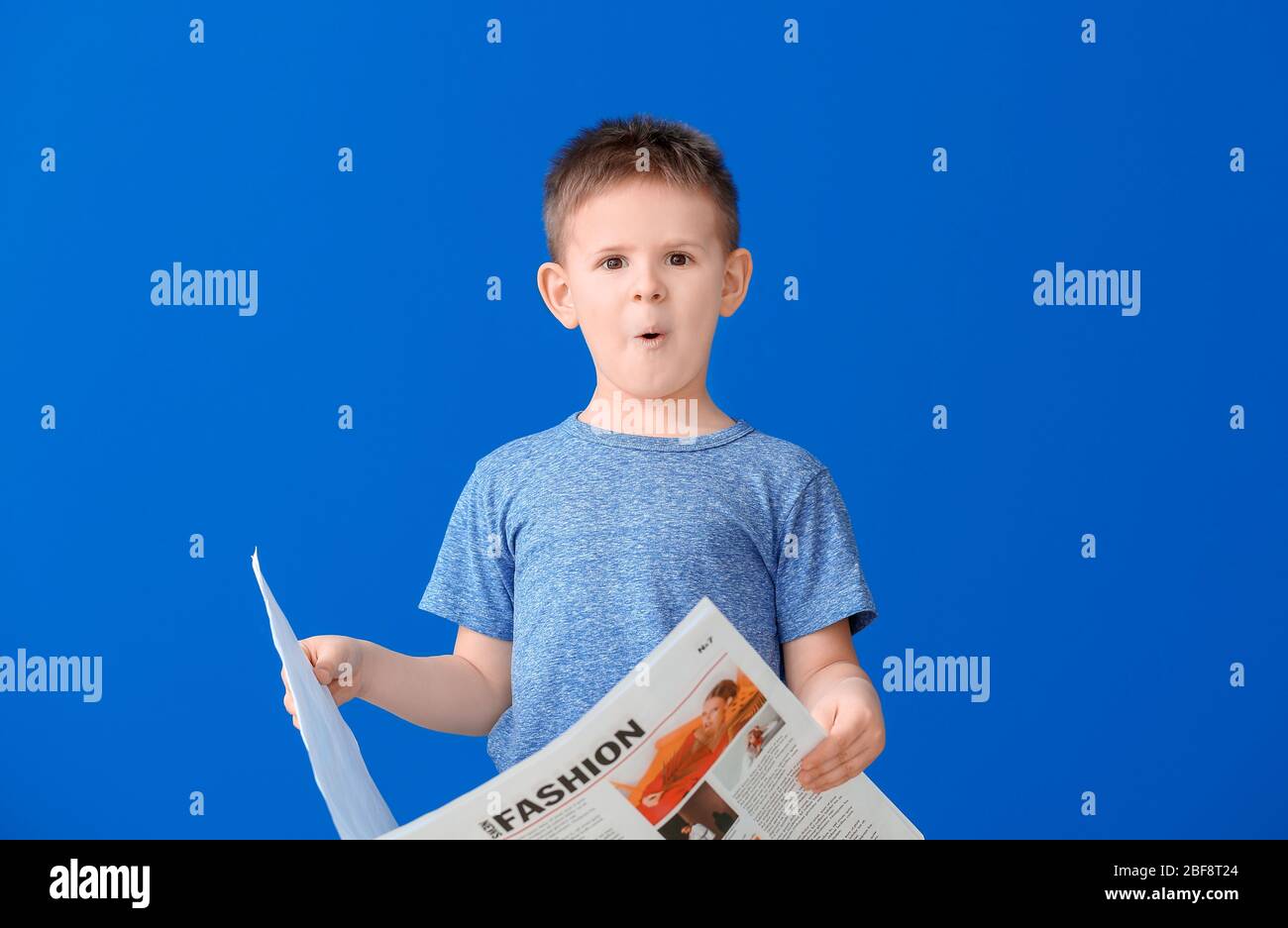 Shocked Little Boy Reading Newspaper On Color Background Stock Photo Alamy Shocked Little Boy Reading Newspaper On Color Background Stock Photo Alamy
