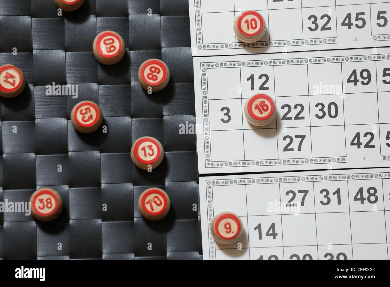 Casino bingo playing cards, game dice and numbers on a black and white