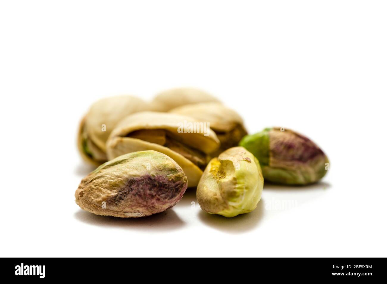 Pistachio nuts isolated on white background Stock Photo