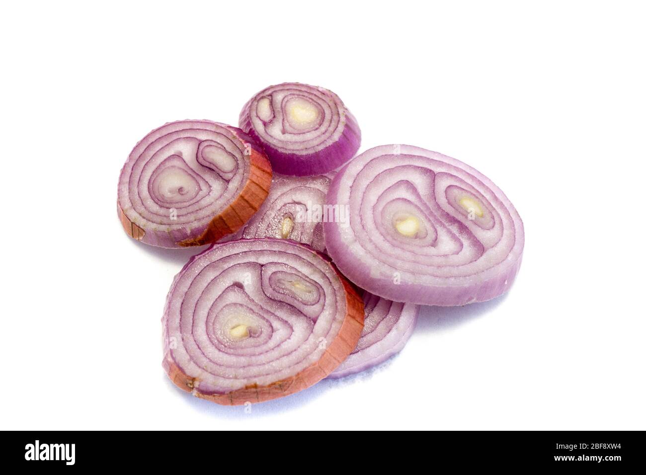 Shallot slices isolated on white background Stock Photo