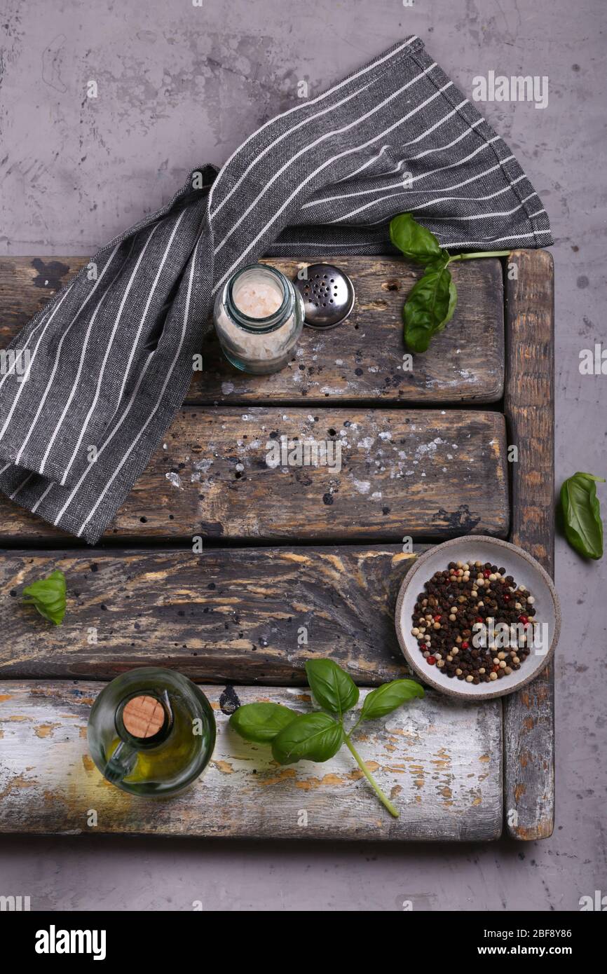 kitchen wooden background with basil Stock Photo - Alamy