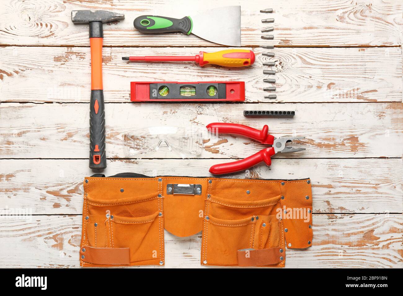 Builder's tools on wooden background Stock Photo