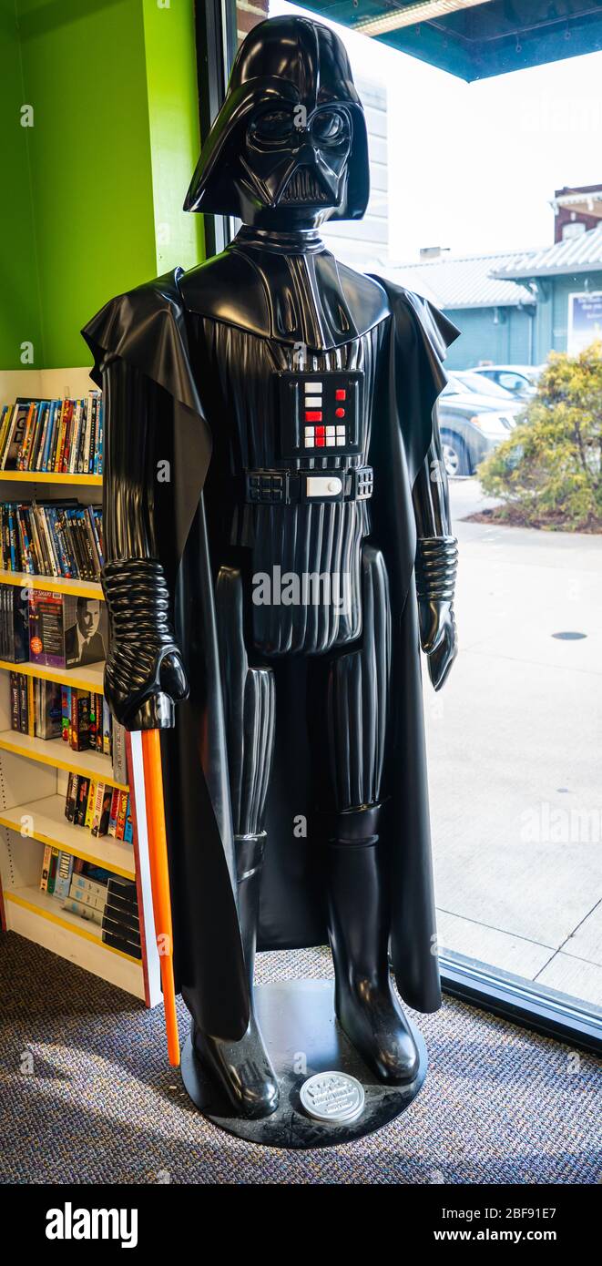 A life-size action figure of Darth Vader kept on display at a comic book store. Stock Photo
