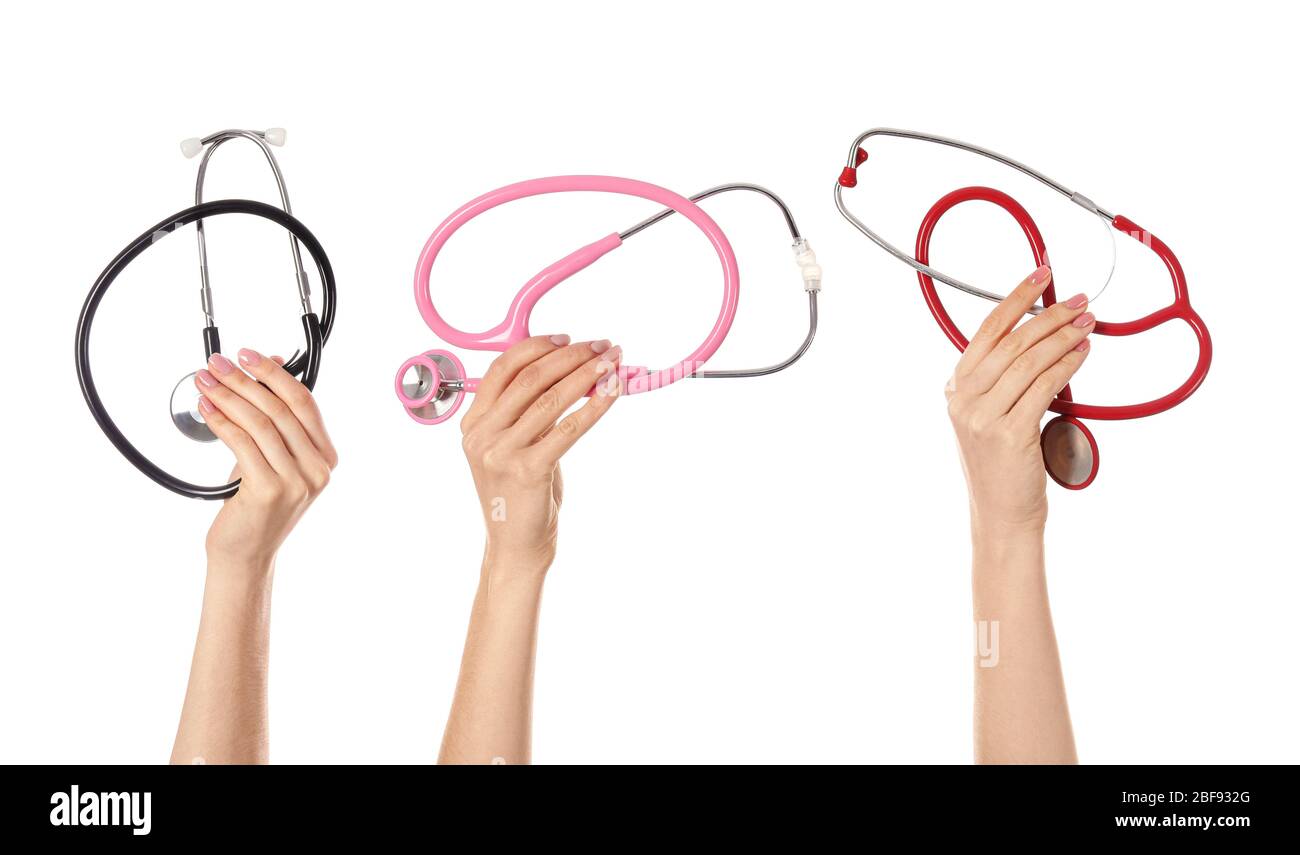 Hands with stethoscopes on white background Stock Photo - Alamy