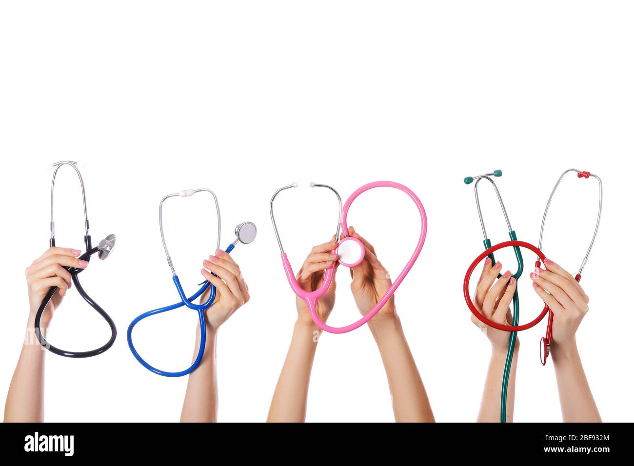 Many hands with stethoscopes on white background Stock Photo - Alamy