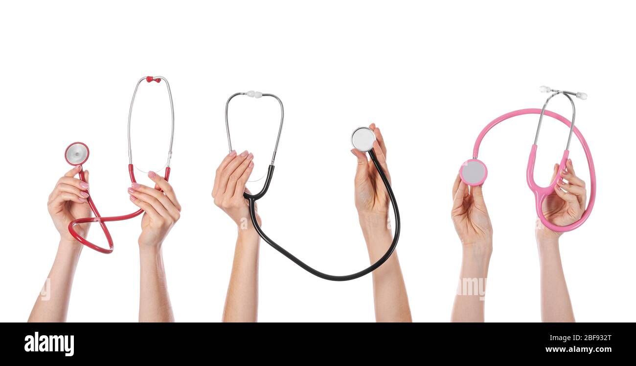 Many hands with stethoscopes on white background Stock Photo - Alamy