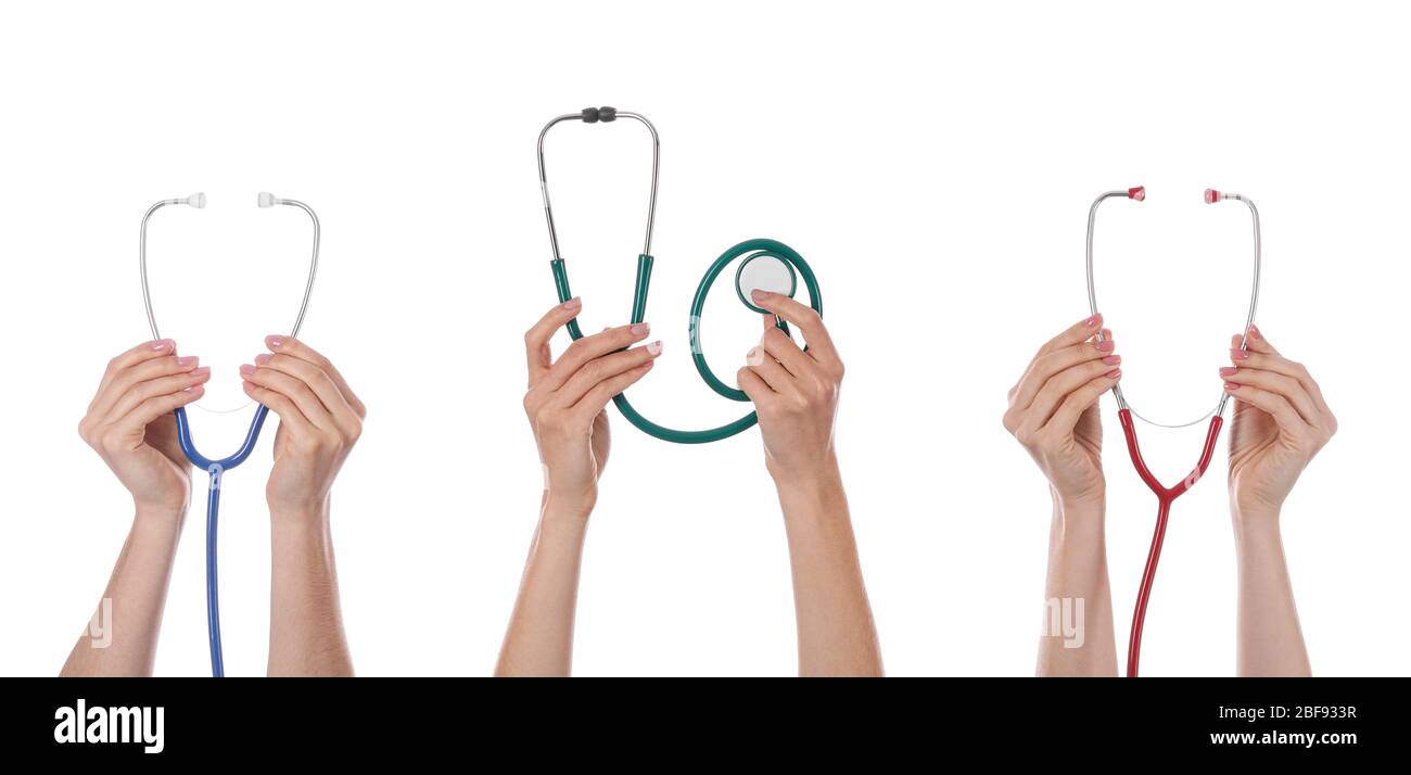 Many hands with stethoscopes on white background Stock Photo - Alamy