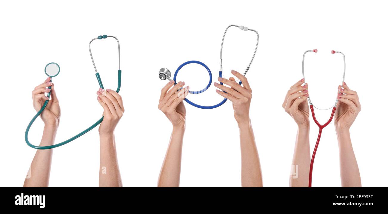 Many hands with stethoscopes on white background Stock Photo - Alamy