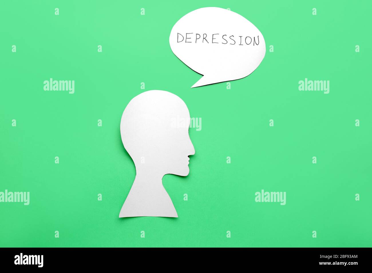 Human head and speech bubble with text DEPRESSION on color background Stock Photo