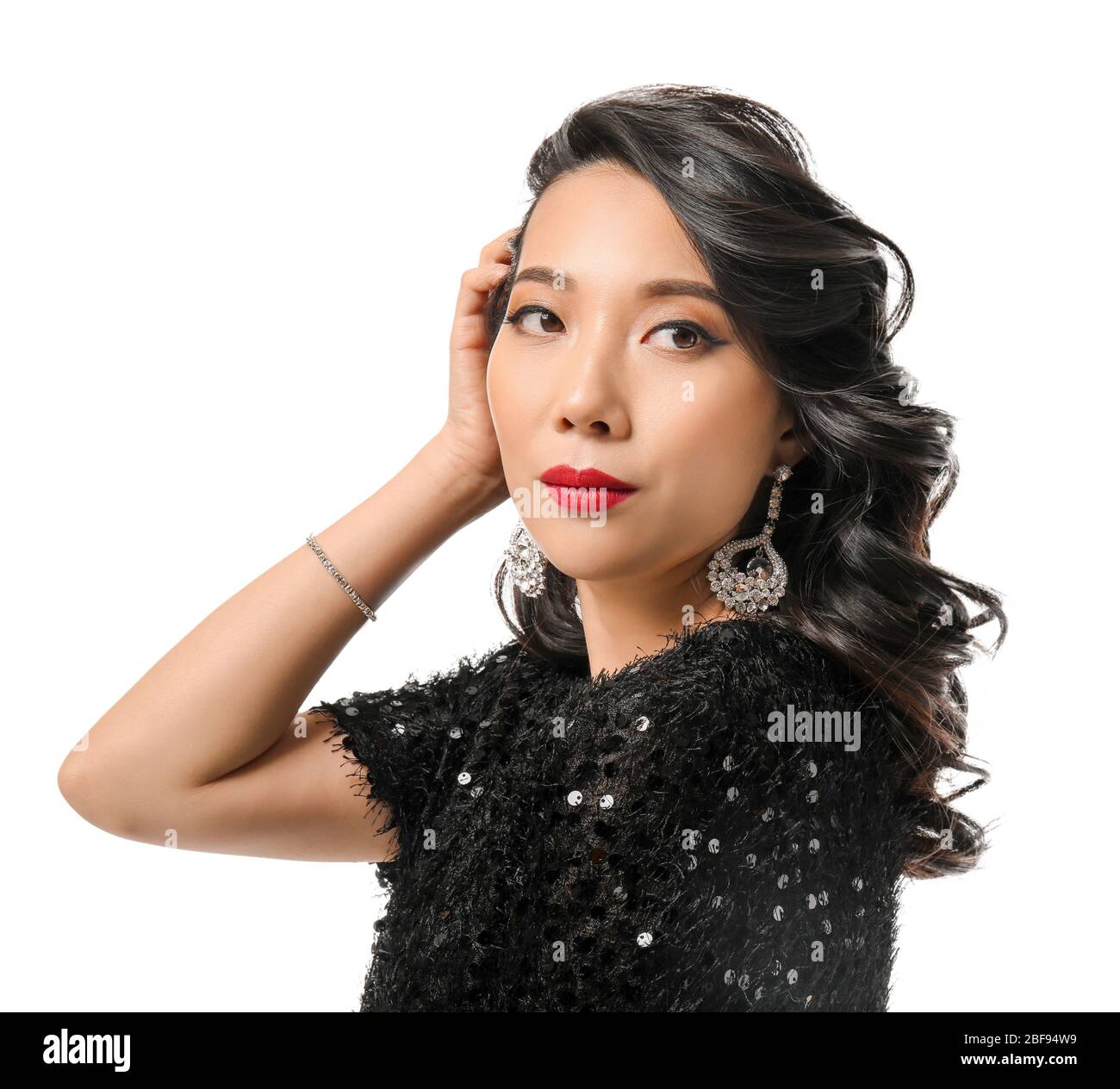Young Asian woman with beautiful hair on white background Stock Photo ...