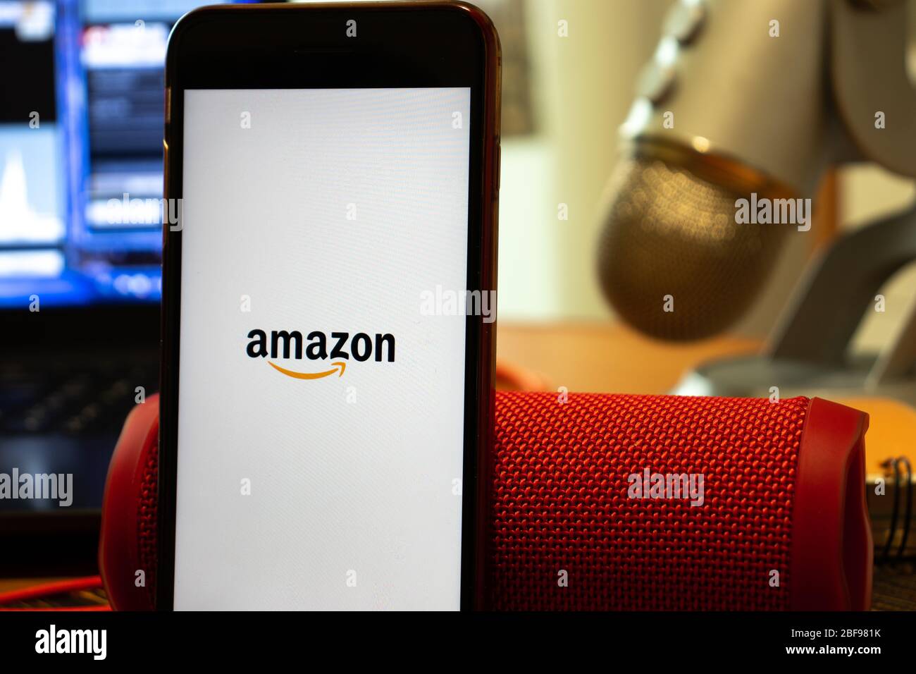 Los Angeles, California, USA - 16 April 2020: Amazon logo on screen close up. App store icon visible on phone display, Illustrative Editorial Stock Photo