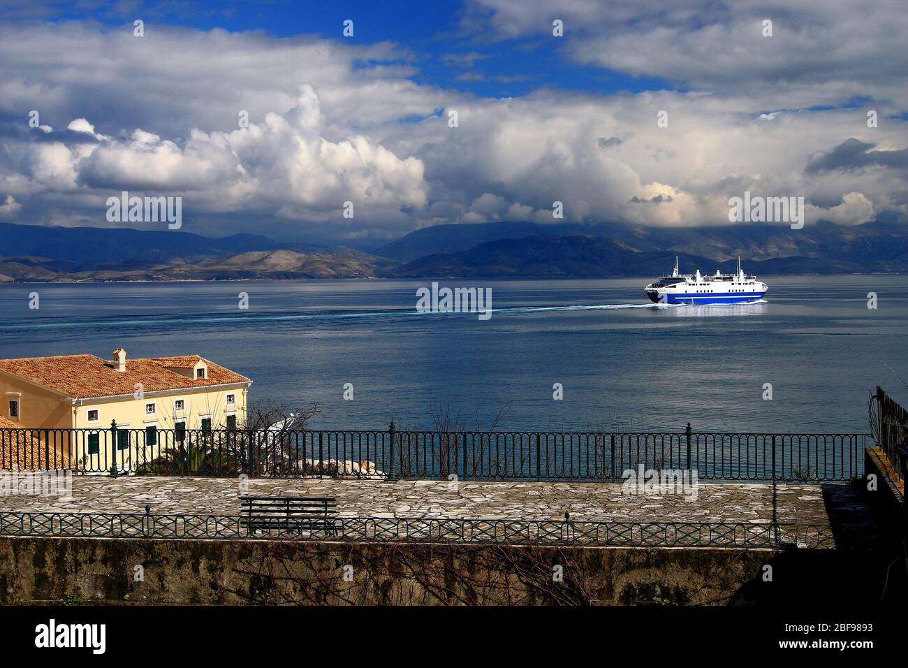 Ship leaving Corfu (Kerkyra) island headint to Igoumenitsa, Ionian Sea, Greece. Stock Photo