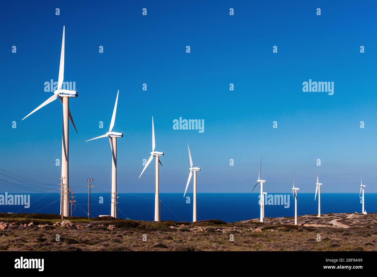 Wind farm at Aforesmenos (also known as 'Agios Ioannis') cape, Municipality of Agios Nikolaos, Lassithi, Crete, Greece. Stock Photo