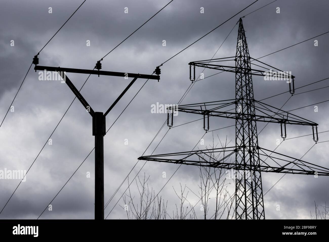 high voltage pylon with power lines Stock Photo - Alamy