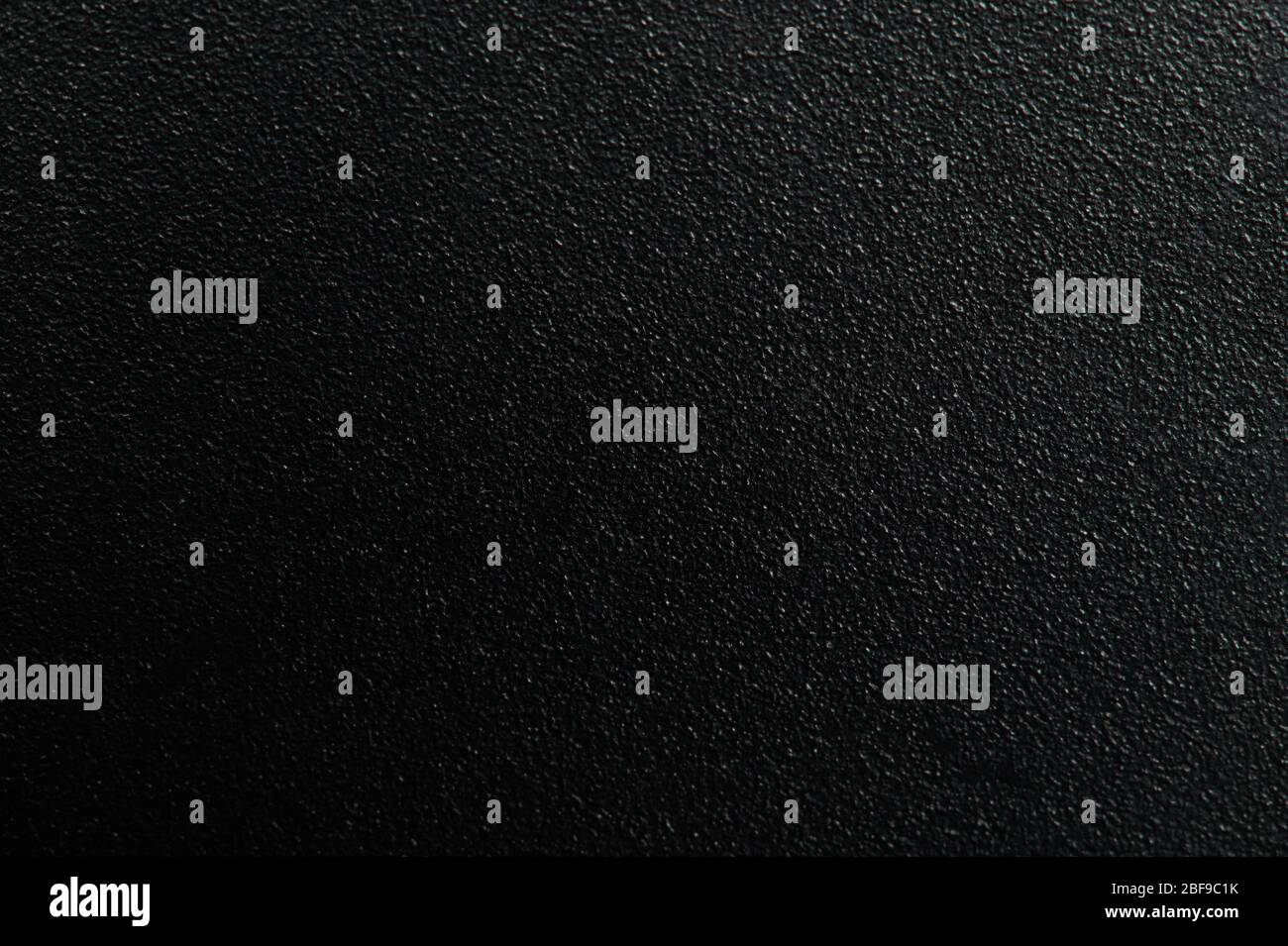 Black metal rough background macro close up view Stock Photo