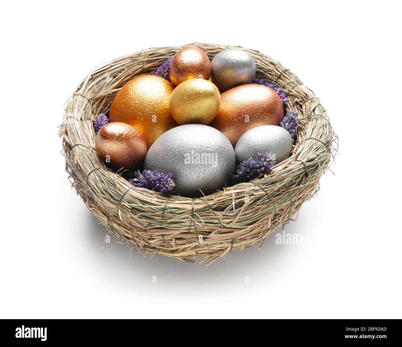 Nest with beautiful Easter eggs on white background Stock Photo - Alamy