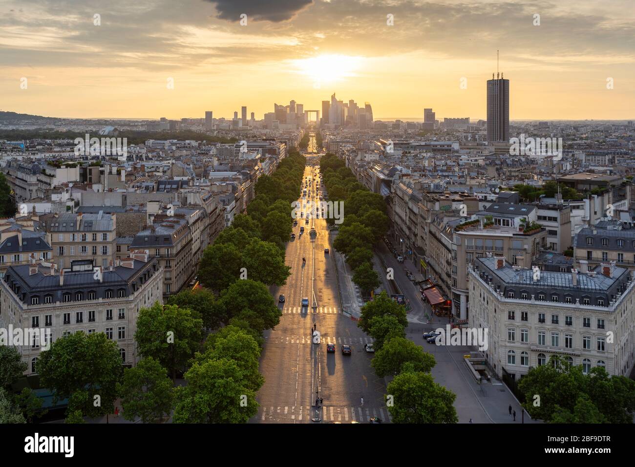Paris cityscape at sunset, view down Avenue de la Grande-Armée, as seen from the Arc de Triomphe Stock Photo