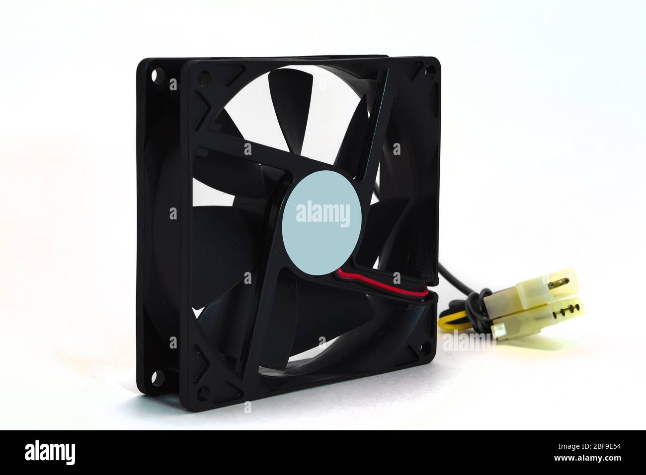 One black plastic fan for desktop computer or notebook for cooling processor and other components isolated on white background. Stock Photo