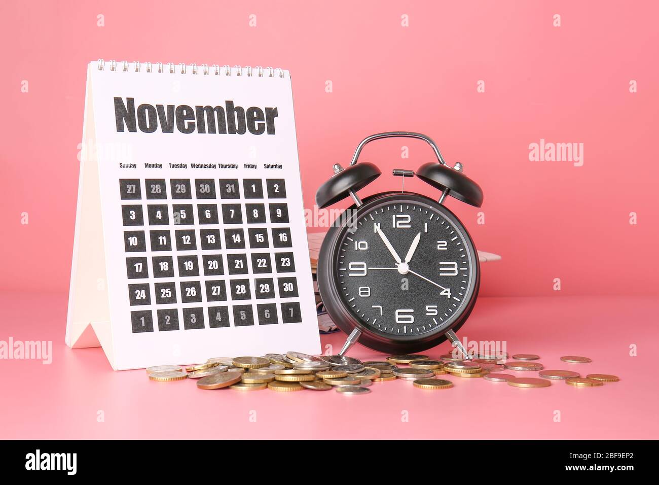 https://c8.alamy.com/comp/2BF9EP2/alarm-clock-calendar-and-coins-on-color-background-time-management-concept-2BF9EP2.jpg