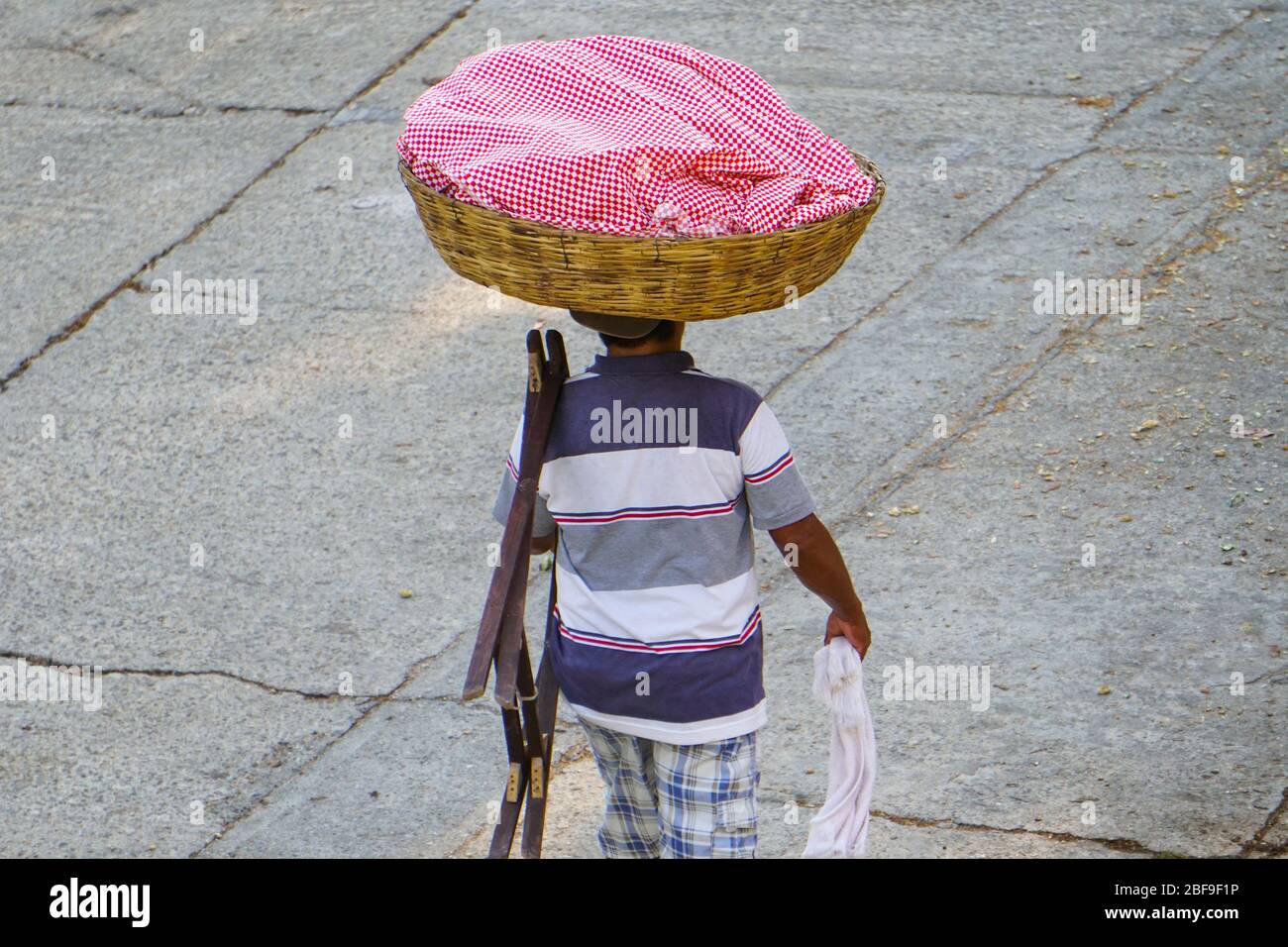 Bread vendor wandering neighborhoods in Acapulco, Mexico. Stock Photo